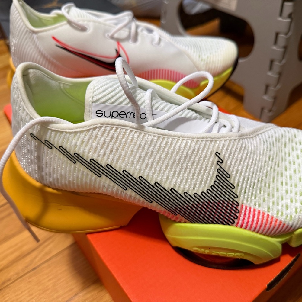 Nike Women's White Training Shoes with Neon Green & Pink Accents